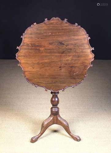 A 19th Century Hardwood Tilt-top Tripod Table with Bird-cage support.