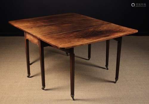 A Handsome George III Mahogany Drop Leaf Table of good colour & patination.