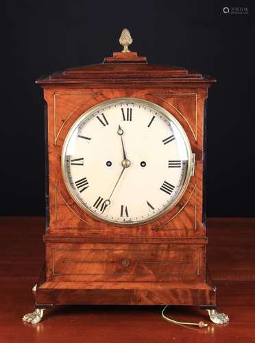 A Regency Mahogany & Brass Inlaid Bracket Clock with eight day twin-fusee movement striking a bell.