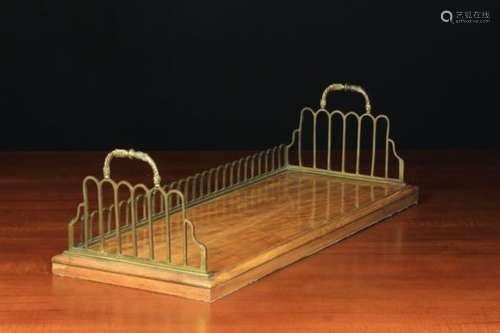 A Regency Satinwood Book Tray with Ormolu Gallery Rails.