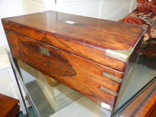 A VICTORIAN ROSEWOOD AND BRASS BOUND WRITING BOX TOGETHER WITH A MAHOGANY JEWELLERY BOX. (2)