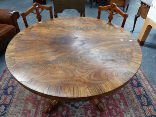 AN EARLY VICTORIAN FLAME MAHOGANY AND ROSEWOOD CROSS BANDED TILT TOP BREAKFAST TABLE ON QUADRUPED