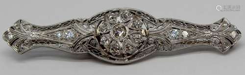 JEWELRY. Art Deco Platinum and Diamond Brooch.