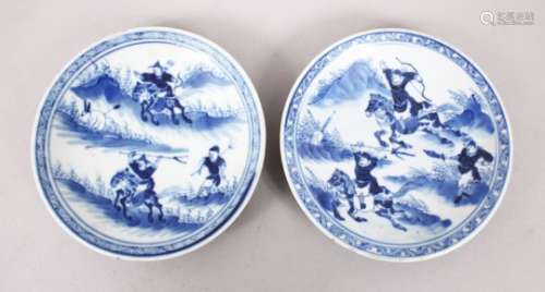 TWO 19TH CENTURY CHINESE BLUE & WHITE KANGXI STYLE PORCELAIN DISHES, decorated with figures upon