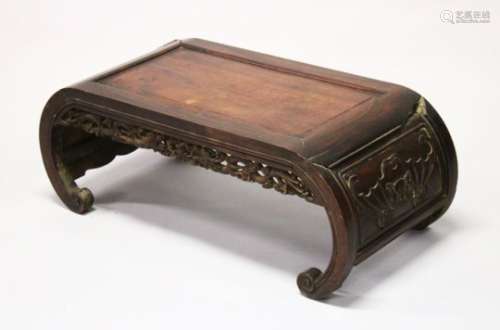 A 19TH CENTURY CHINESE HARDWOOD / PADOUK COFFEE / OPIUM TABLE, feet of scrolling form, the apron