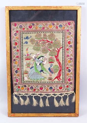 A GOOD 19TH / 20TH CENTURY FRAMED ISLAMIC / PERSIAN EMBROIDERED SILK OF A LADY, the silk depicting a