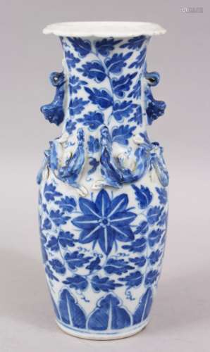 A 19TH CENTURY CHINESE BLUE AND WHITE PORCELAIN VASE, the body decorated with four moulded chilong