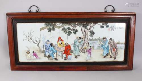 A 20TH CENTURY CHINESE FAMILLE ROSE REPUBLIC STYLE FRAMED PLAQUE, the plaque depicting scenes of