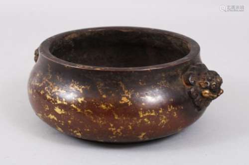 A GOOD HEAVY CHINESE BRONZE & GOLD SPLASH TWIN HANDLE CENSER, the handles formed from lion dog