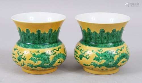 A GOOD PAIR OF CHINESE YELLOW GROUND FAMILLE VERTE PORCELAIN DRAGON BOWLS, the exterior decorated