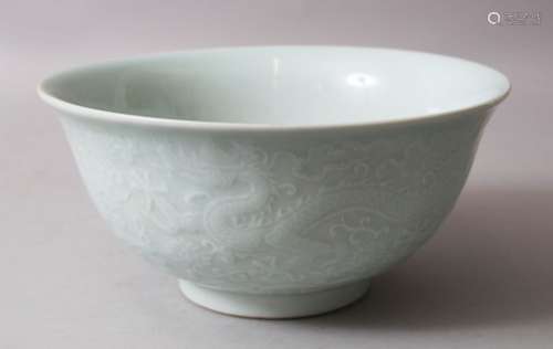 A CHINESE CLAIR DE LUNE & BLUE & WHITE PORCELAIN CARVED BOWL, the body of the bowl carved /