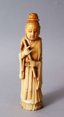 A GOOD 19TH CENTURY CHINESE CARVED IVORY / TOOTH FIGURE OF GUANYIN, stood holding an instrument,