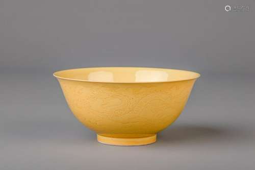 A Chinese yellow ground bowl with incised underglaze