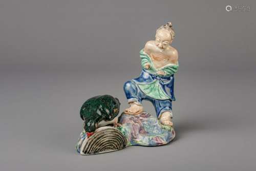 A Chinese polychrome 'The mussel and the heron' group,