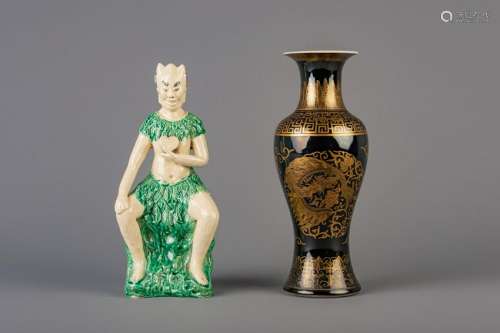A Chinese monochrome black gilt decorated vase and a