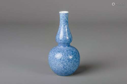 A Chinese monochrome powder blue double gourd vase,