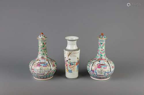 A pair of Chinese famille rose bottle vases and a