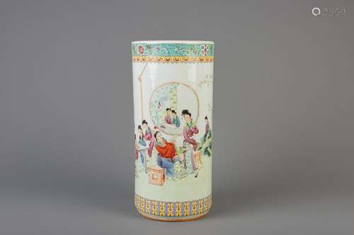 A cylindrical Chinese famille rose vase with ladies in