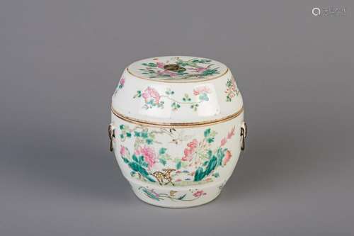 A Chinese famille rose jar and cover with floral