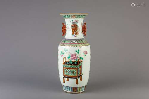 A Chinese famille rose vase with flowers and