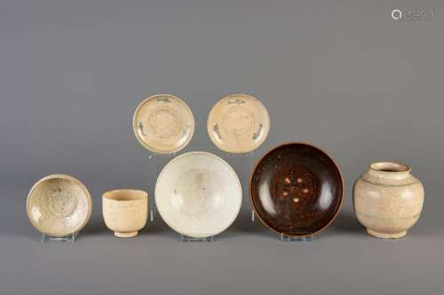 Six Vietnamese glazed saucers and bowls and a vase,