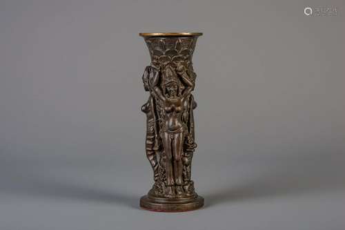 A South Indian patinated bronze vase shaped sculpture