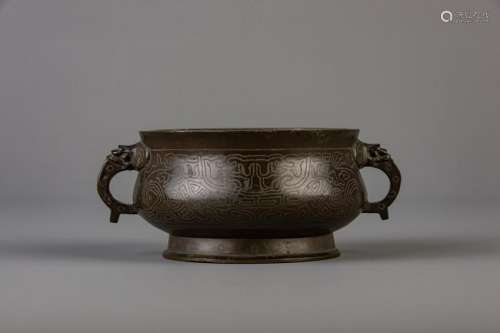 A Chinese silver-inlaid bronze incense burner, Shishou