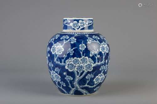 A Chinese blue and white covered ginger jar with prunus