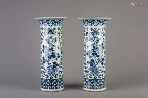 A pair of Chinese blue and white cylindrical vases with