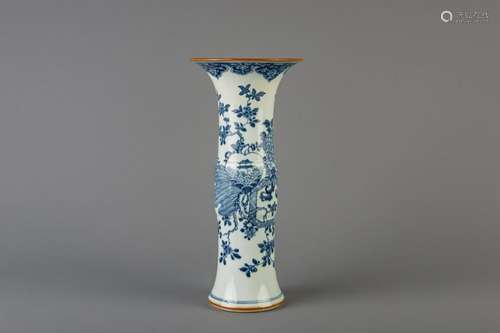 A Chinese blue and white gu beaker vase with floral