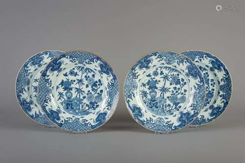 Four Chinese blue and white plates with floral design,