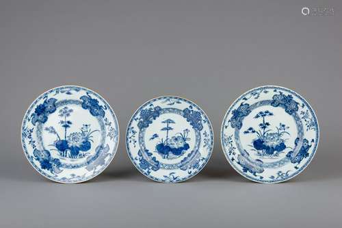 A pair of Chinese blue and white chargers and a plate