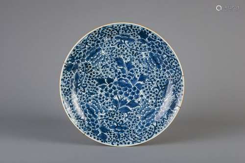 A Chinese blue and white charger with floral design,