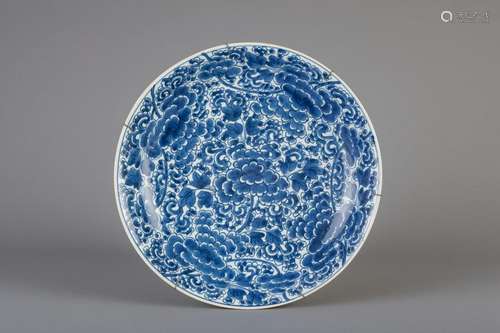 A Chinese blue and white charger with floral design,