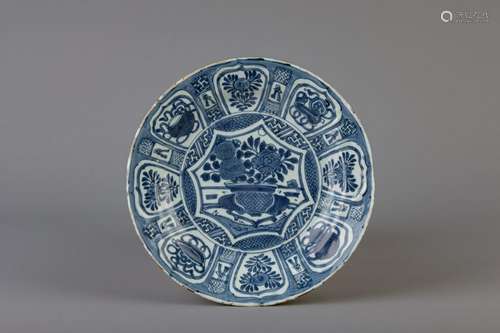 A Chinese blue and white plate with flowers and