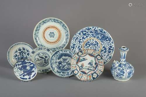 Seven Chinese blue and white and famille verte plates