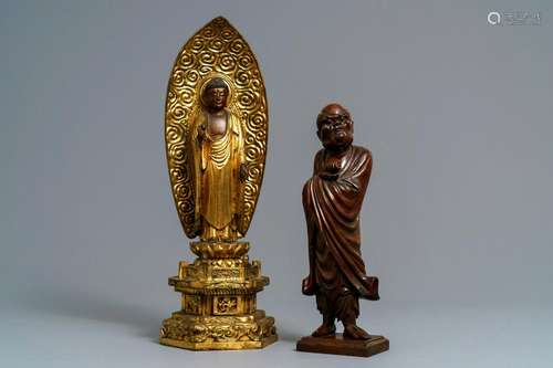 A Japanese giltwood figure of Buddha and a 'Daruma'