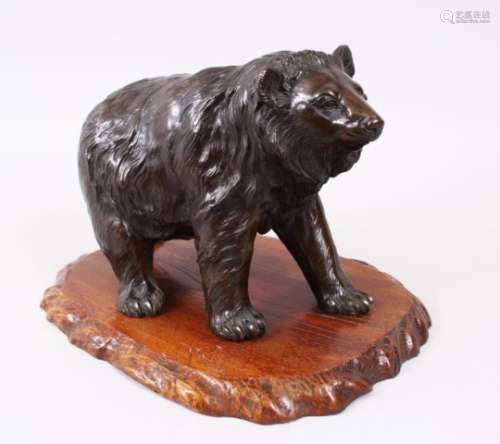 A GOOD JAPANESE MEIJI PERIOD BRONZE BEAR OKIMONO, The bear in a striding pose and realistically