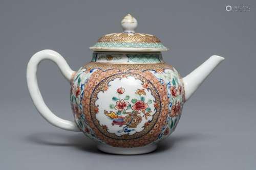 A Chinese famille rose teapot and cover with floral