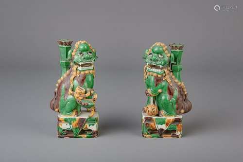 A pair of sancai glazed biscuit Buddhist lion