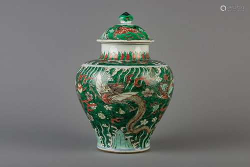 A Chinese famille verte vase and cover with mythical