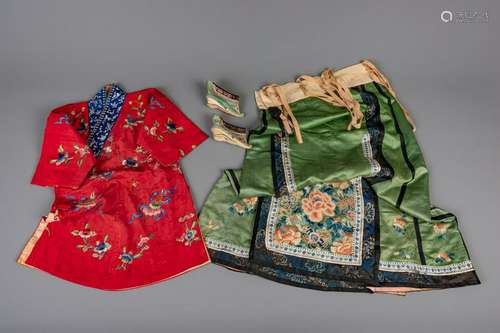 A Chinese embroidered red children's robe, a green silk