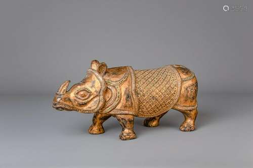 A Thai gilt lacquered rhino figure, 19th/20th C.