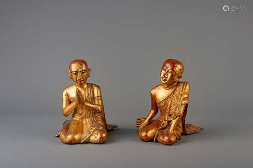 A pair of Thai gilt lacquered servant figures,