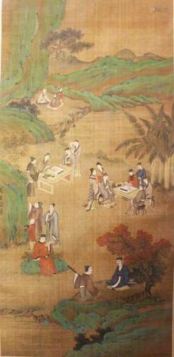 A 19TH CENTURY CHINESE HAND PAINTED SILK HANGING SCROLL, depicting scenes of figures within