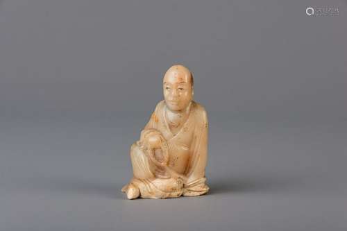 A Chinese soapstone figure of a sage, 19th C.