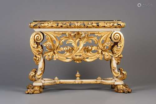 A Venetian gilt and patinated wooden console with a