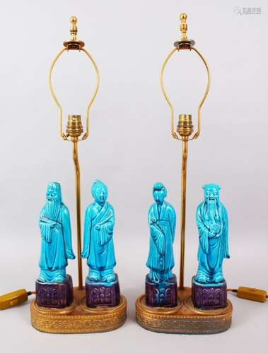 A GOOD PAIR OF 19TH CENTURY CHINESE KANGXI STYLE TURQUOISE PORCELAIN FIGURAL LAMPS, each lamp