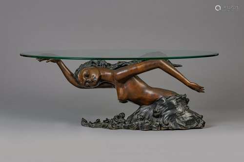 A bronze mermaid coffee table with oval glass top, 20th