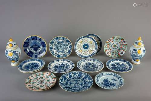 Fourteen Dutch Delft blue and white and polychrome